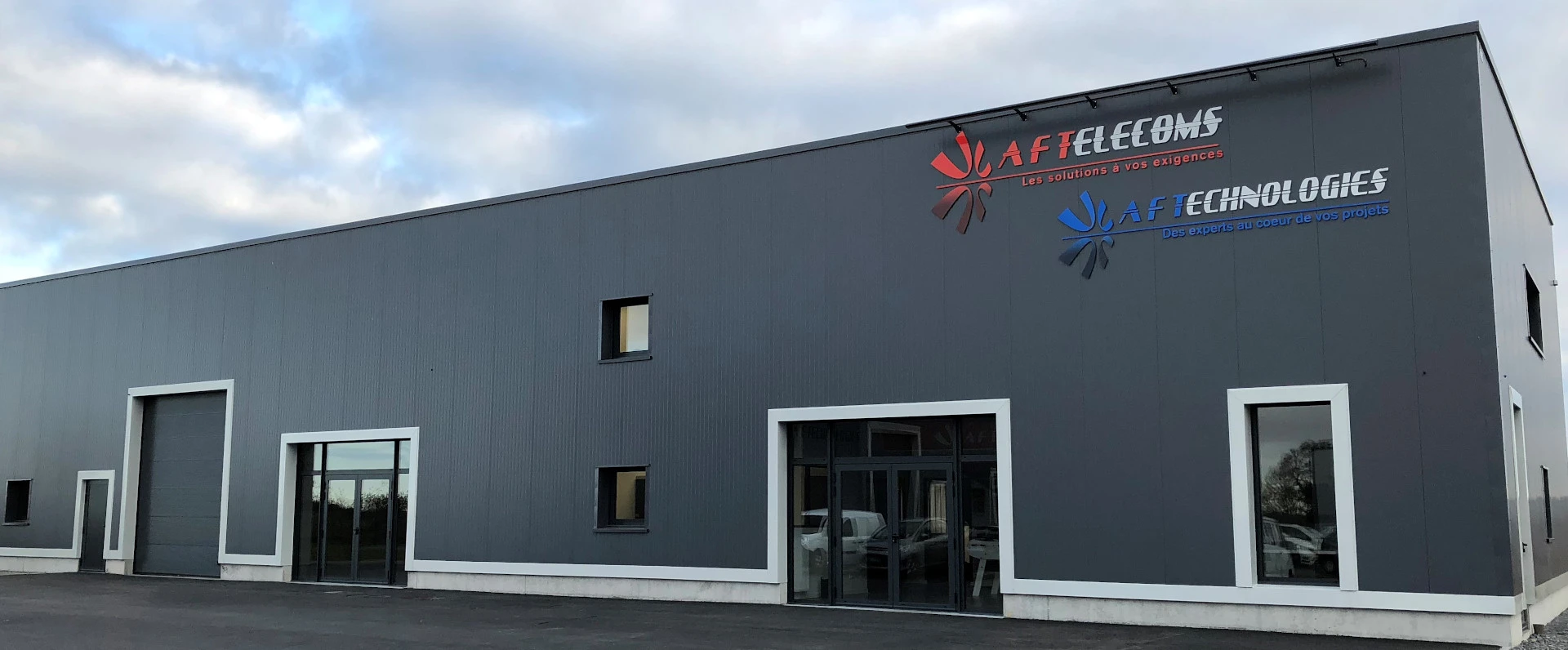 AF TECHNOLOGIES - Expert en systèmes de vidéosurveillance et de sécurité à Ranville Devanture avec logo AF TECHNOLOGIES